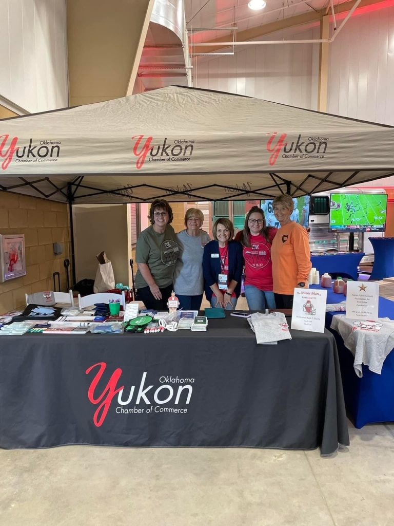 Yukon Chamber Members at a Yukon Chamber booth at an event.